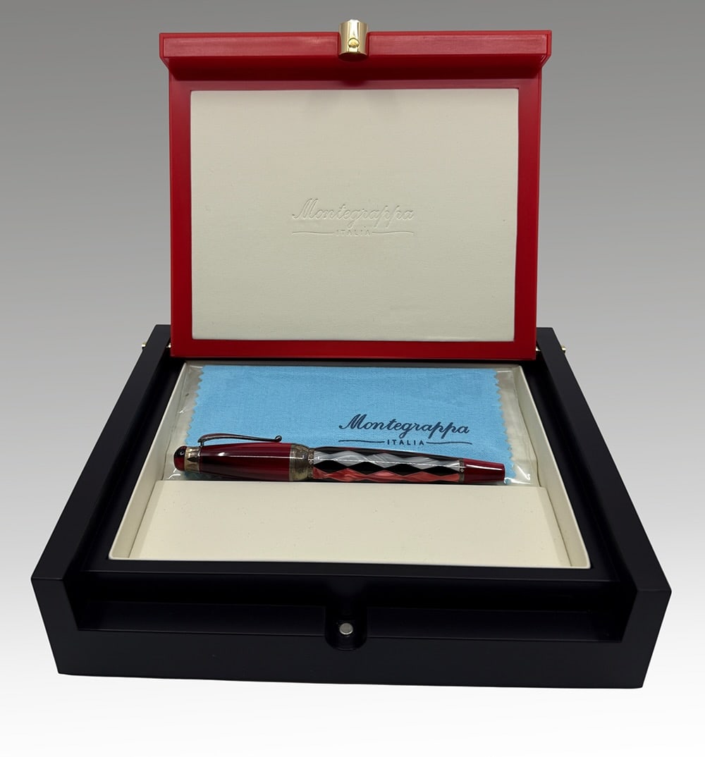 Montegrappa “Invito a Rigoletto?? Limited Edition Fountain Pen: No. 370/900 . Inspired by Giuseppe Verdi’s famous opera Rigoletto. The pen features a red resin body accented with sterling silver trim. The cap is topped with a decorative red glass murrina The poc
