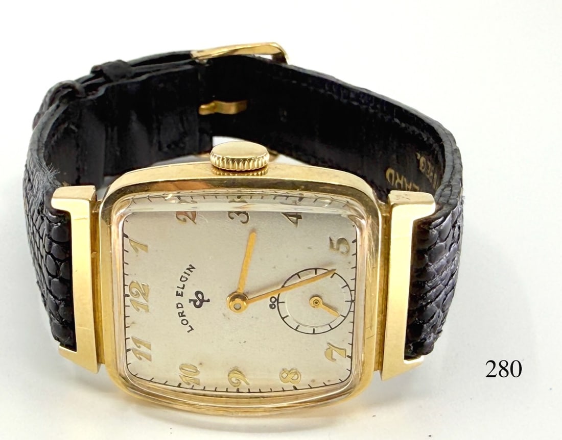 Lord Elgin Wristwatch: Model 2, 21j, Medusa, engraved Portland Cement Co., 25yr service, 1949, 14k. Total Weight with band 27g