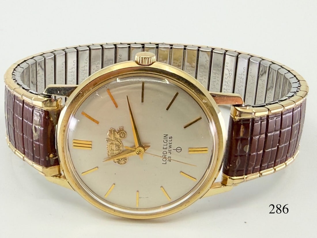 Lord Elgin Wristwatch: 23j, Fisher Body 35yr service , 14k gold, c1962. Total Weight with band 58.4g