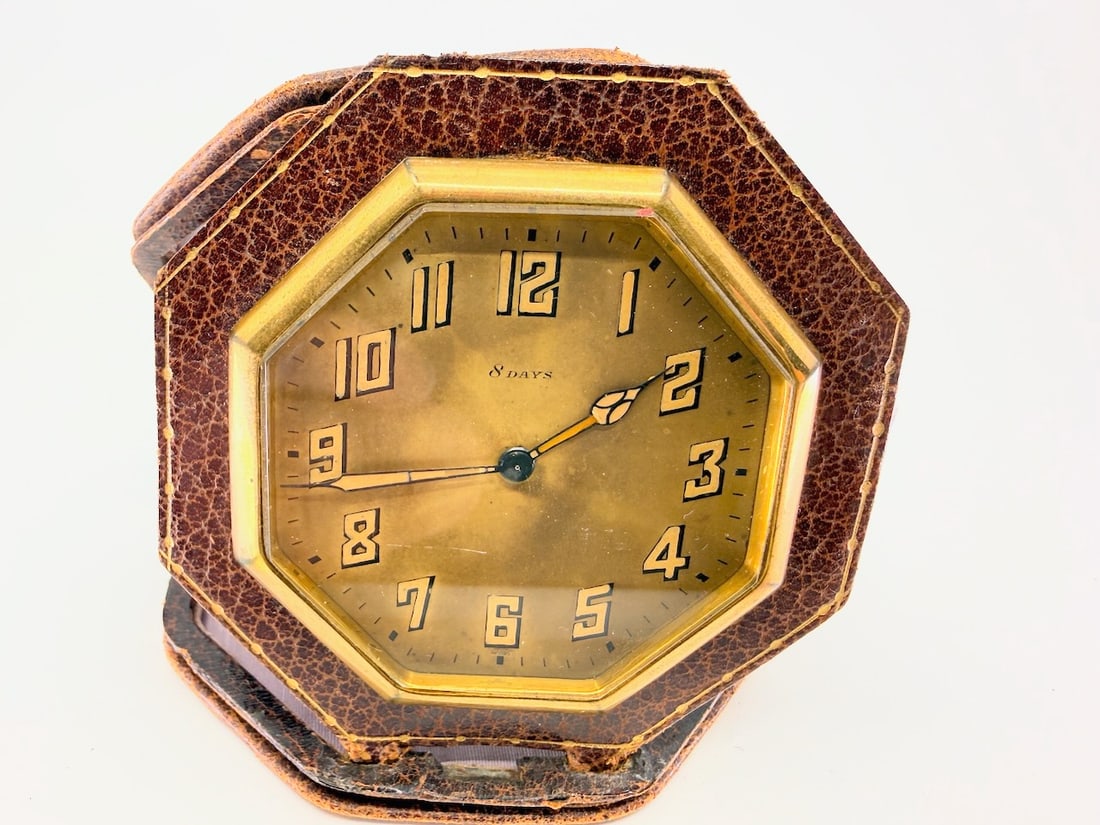 William Sprague Swiss Alarm Clock: Luminous hands and leather case. C1930s