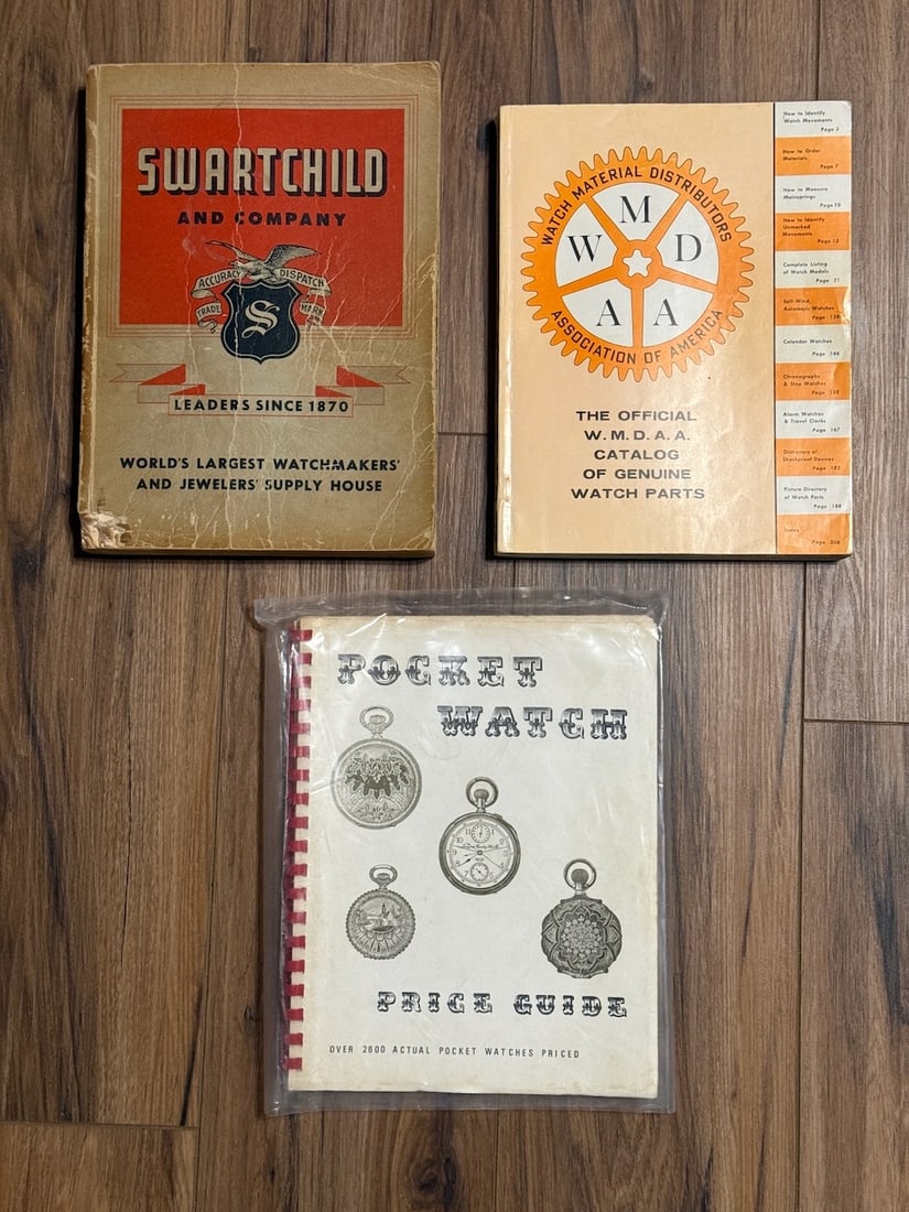 3 Watch Reference Books and Catalogs: 1951 Swartchild and co. 610pg. Catalog, 1957 W.M.D.A.A. 210pg. Catalog and Pocket Watch Price Guide.