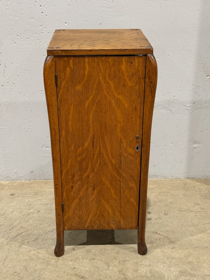 Single Door Oak Disc Record Cabinet: Single Shelf, measures approximately 15" x 15" x 32". Refinished