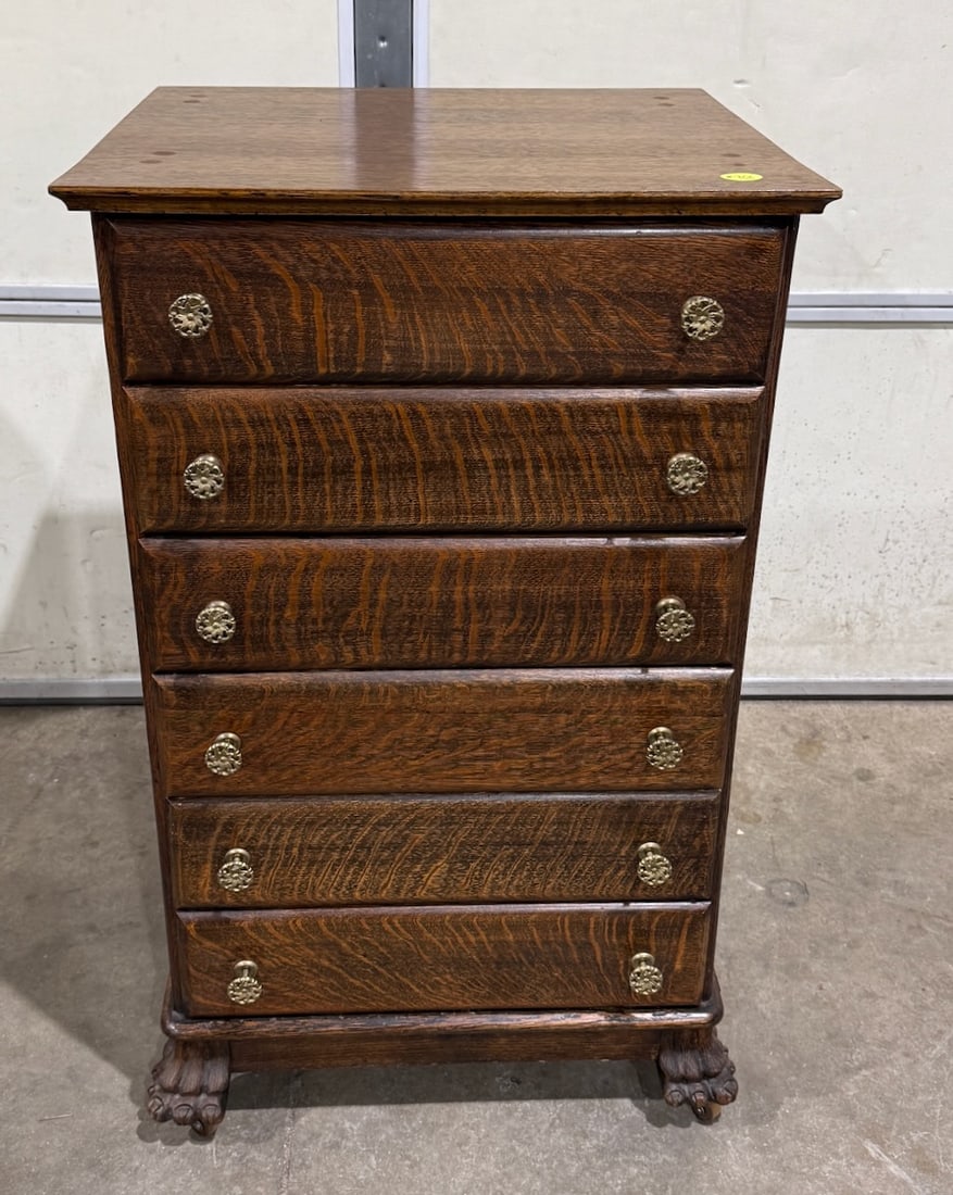 Oak Six Drawer Record Cabinet: Claw feet, original Pegs. Hold 268 cylinders. Measures approx. 23" x 21-1/2" x 37-1/2". Refinished