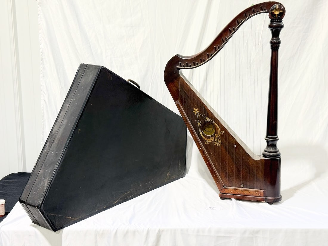 Automatic harp with Carrying Case: Manufactured by The Ward-Williams co., New London, Oh. Measures 20-1/2" x 35-1/2" .Includes carrying case.