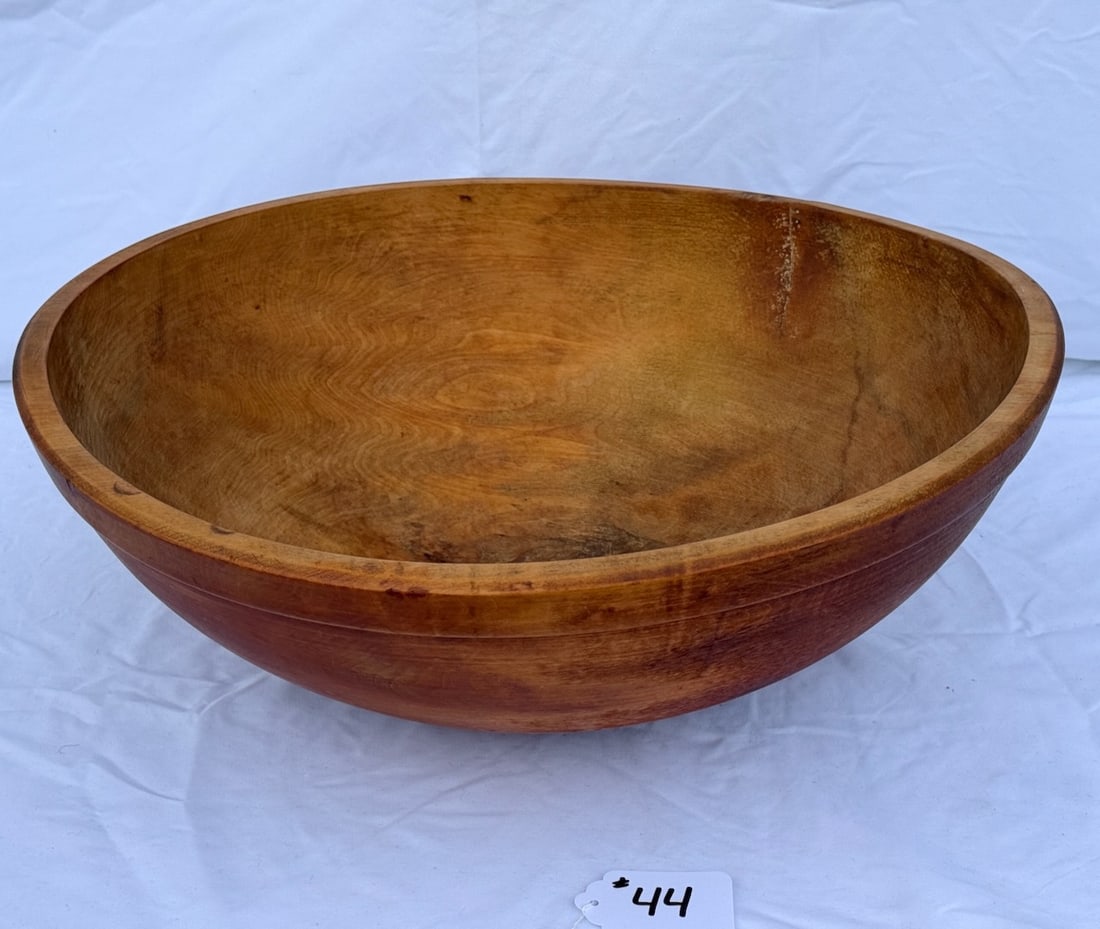 Large Wooden Butter Bowl: 20" diameter; 7-1/2" deep; 3" tight rim crack; marked "Munising"