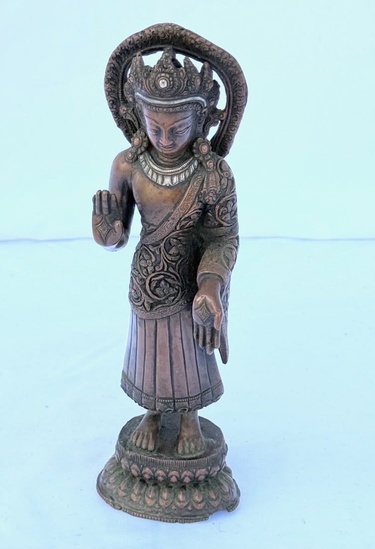Bronze Nepalese Deity Statue: Heavily embossed; 9-1/2" x 3"