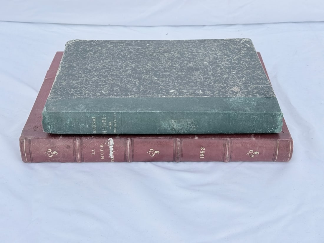 2 Early French Fashion Books: LaMode Francais 1863; over 400 pages with individual colored plates. "Journal For James Et Des Demoiselles' 1873-74; over 375 pages; again with colored plates, etc.