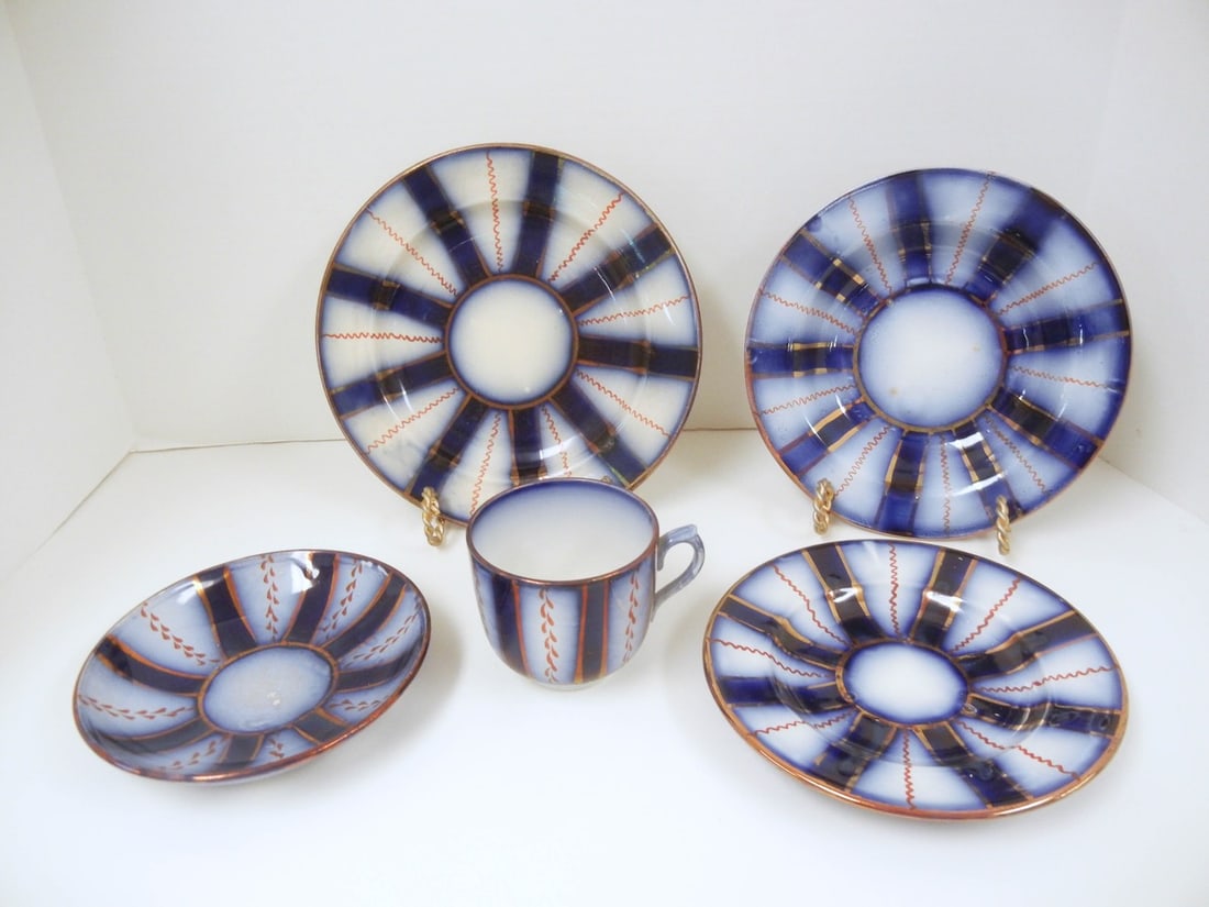 Flow Blue: Wheel, 8" Plate, 6 3/4" Plate, 7 1/2" Soup Bowl, Cup & Saucer: Wheel, Gaudy Welsh, Copper Lustre, (PID # 2672/PID # 0110), Davenport/Allerton, Circa 1873/1891, Hairline/Staining on 8" Plate