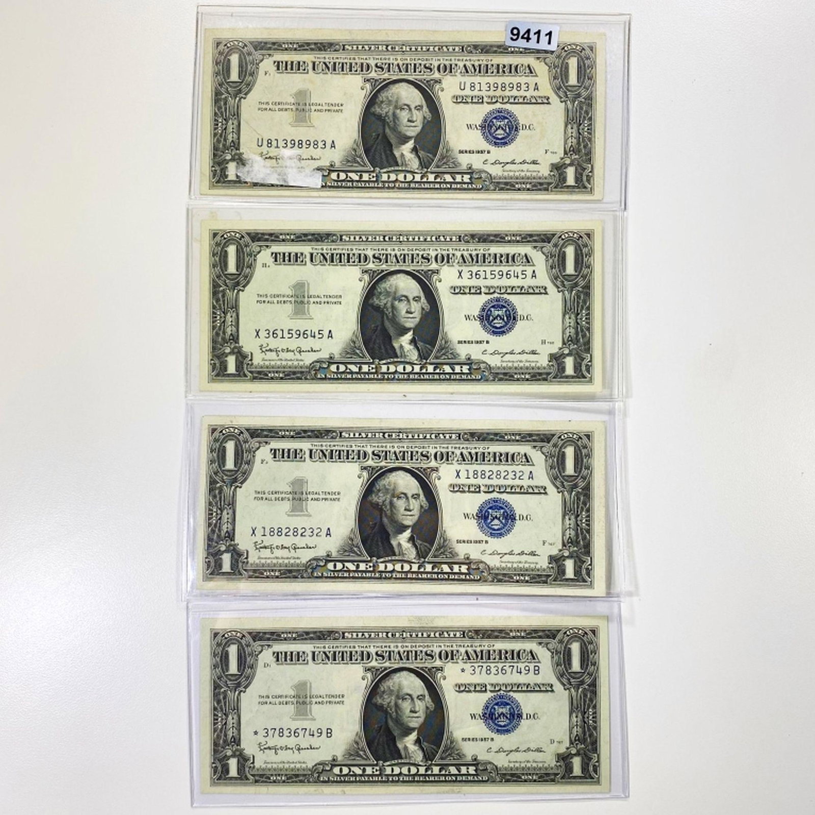 (4) 1957-B Blue Seal $1 Bills UNCIRCULATED: (4) 1957-B Blue Seal $1 Bills UNCIRCULATED