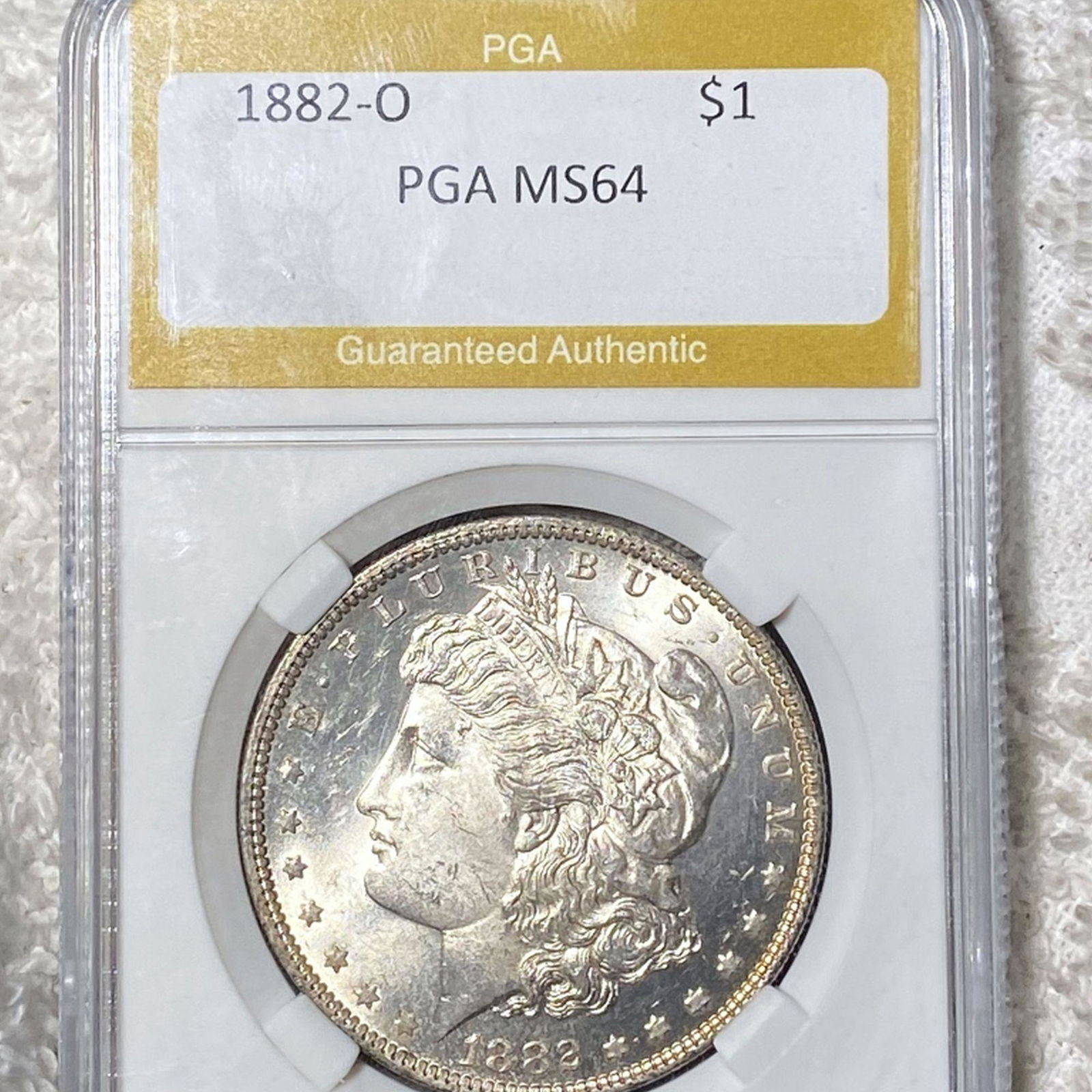 1882-O Morgan Silver Dollar PGA - MS64 (1 of 2)