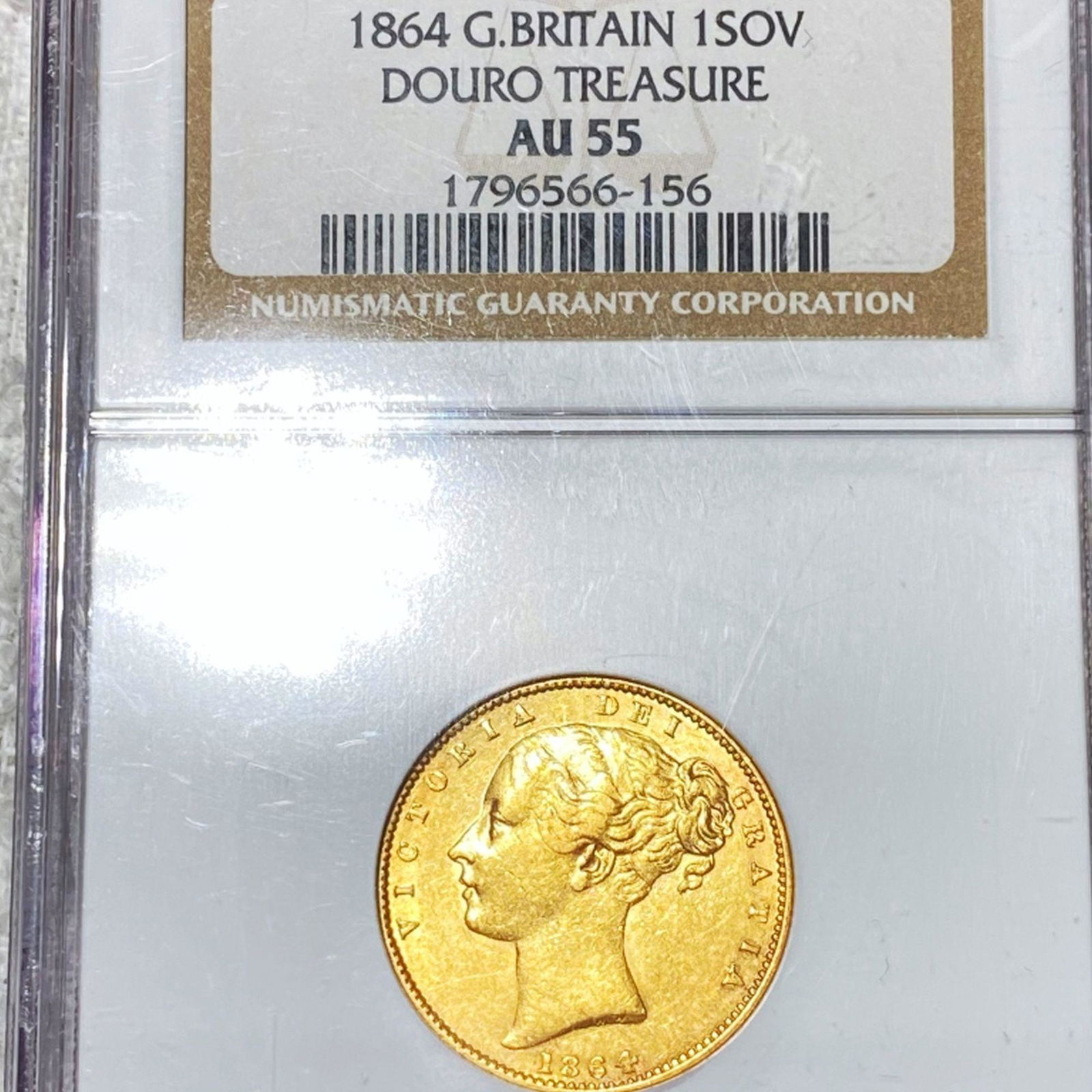1864 Great Britain Gold Sov NGC - AU55 DOURO TRES (1 of 2)
