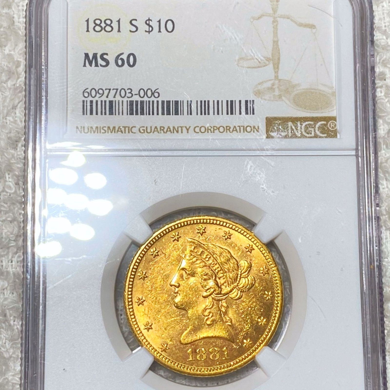 1881-S $10 Gold Eagle NGC - MS60 (1 of 2)