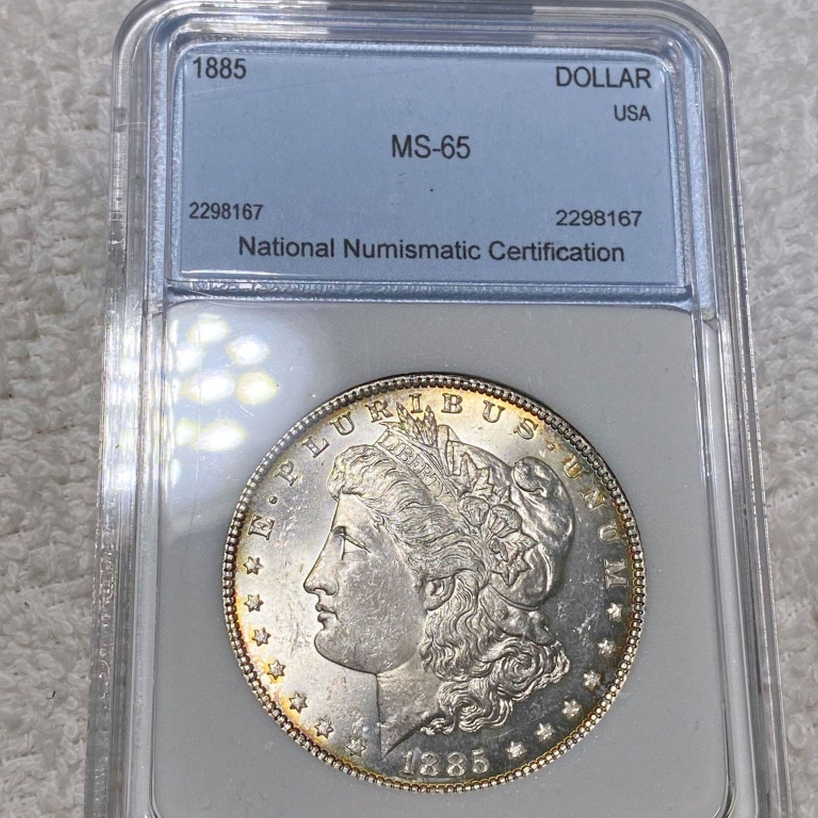 1885 Morgan Silver Dollar NNC - MS65 (1 of 2)