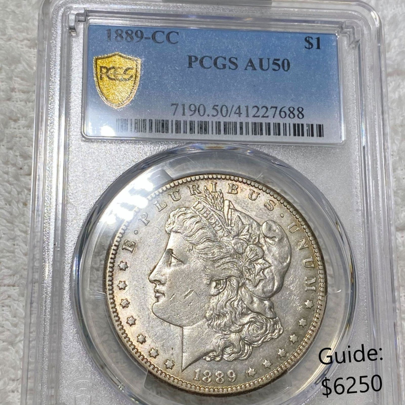 1889-CC Morgan Silver Dollar PCGS - AU50 (1 of 2)