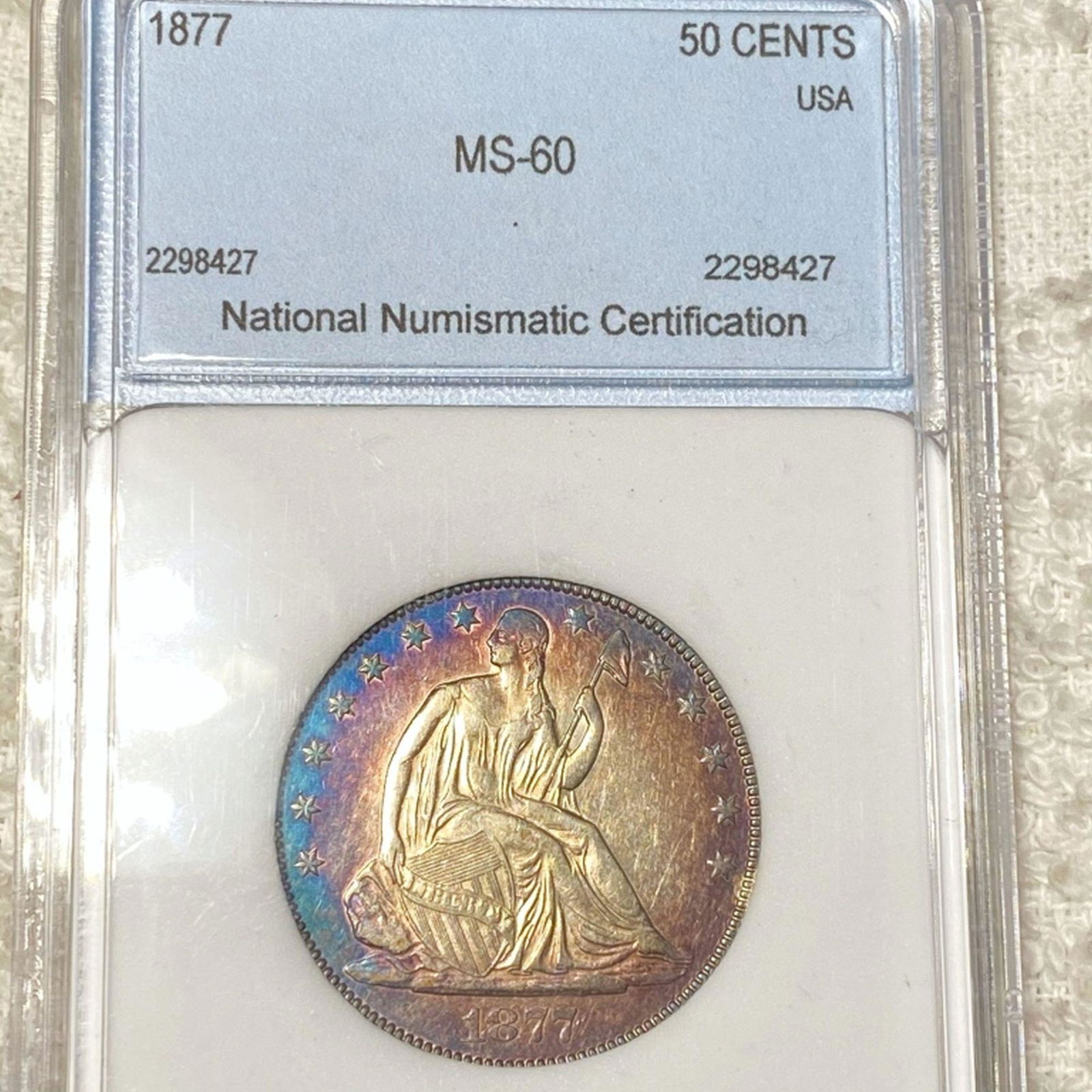 1877 Seated Half Dollar NNC - MS60 (1 of 2)