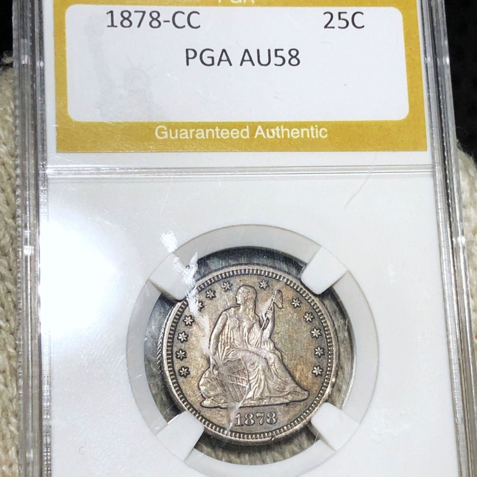 1878-CC Seated Liberty Quarter PGA - AU58 (1 of 2)