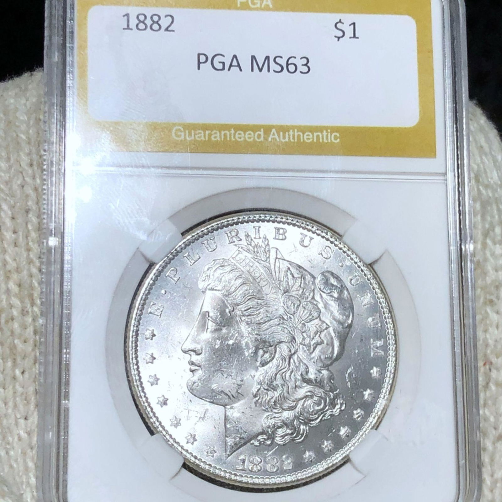 1882 Morgan Silver Dollar PGA - MS63 (1 of 2)