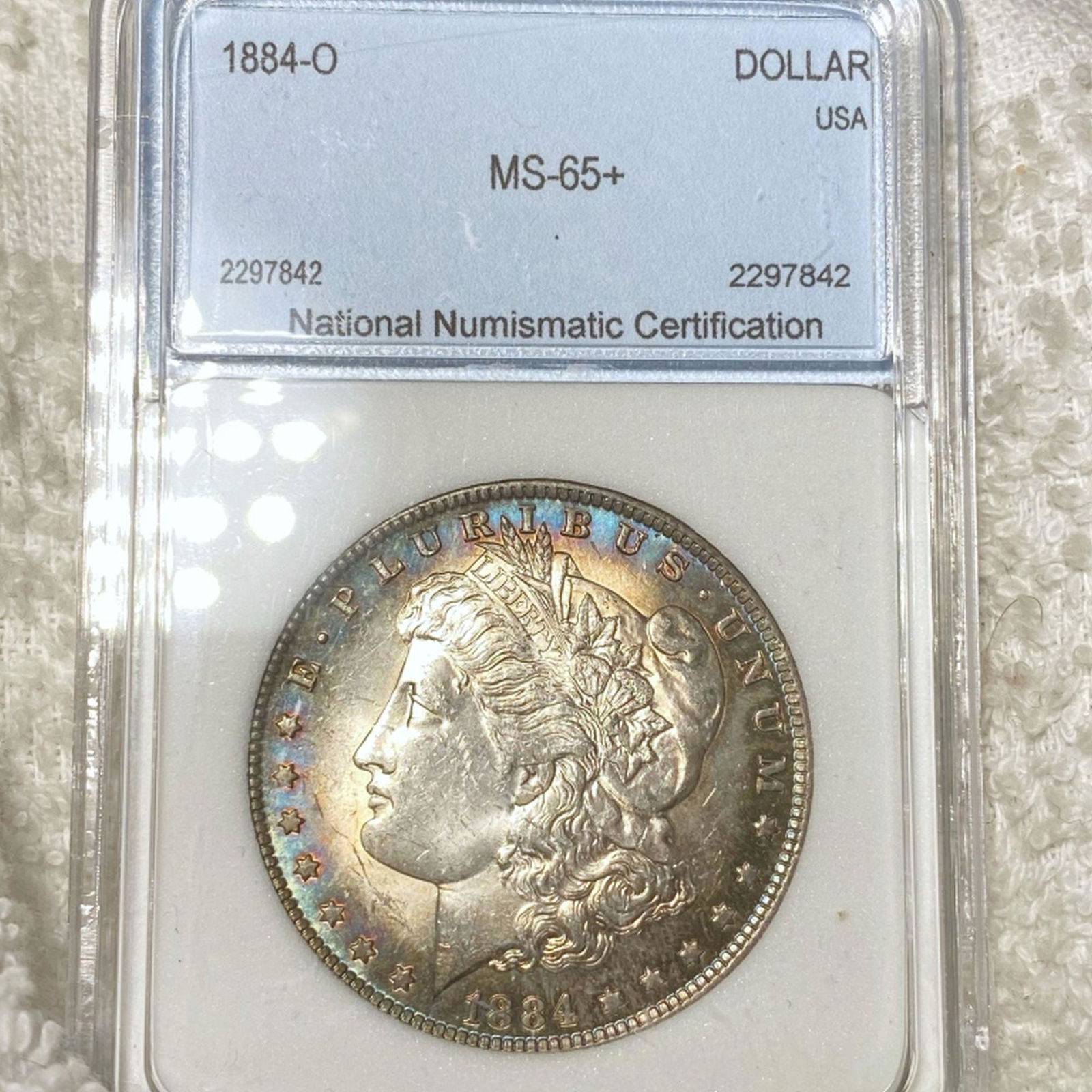 1884-O Morgan Silver Dollar NNC - MS65+ (1 of 2)