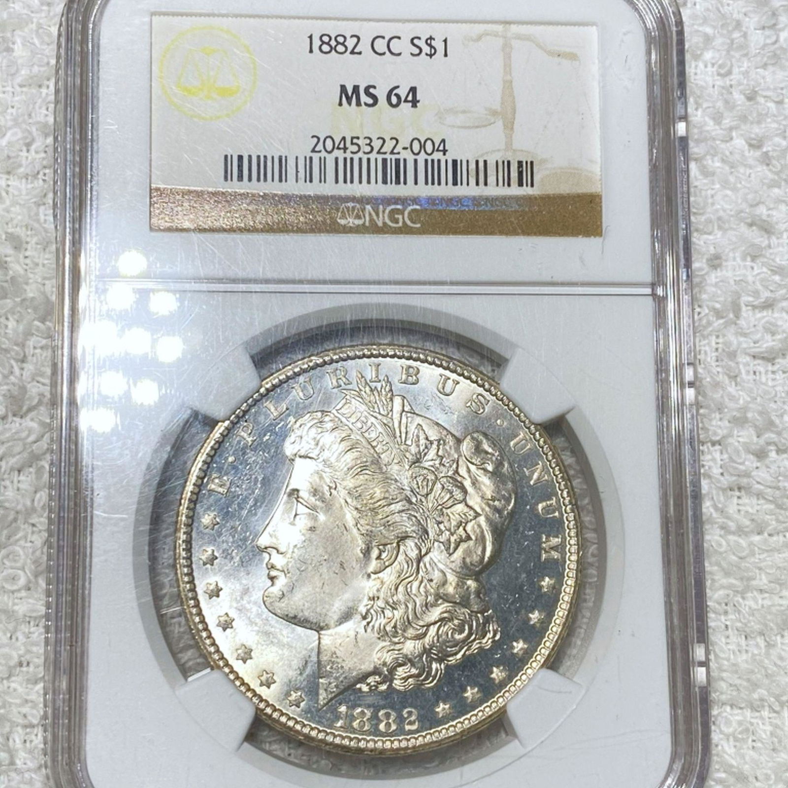 1882-CC Morgan Silver Dollar NGC - MS64 (1 of 2)