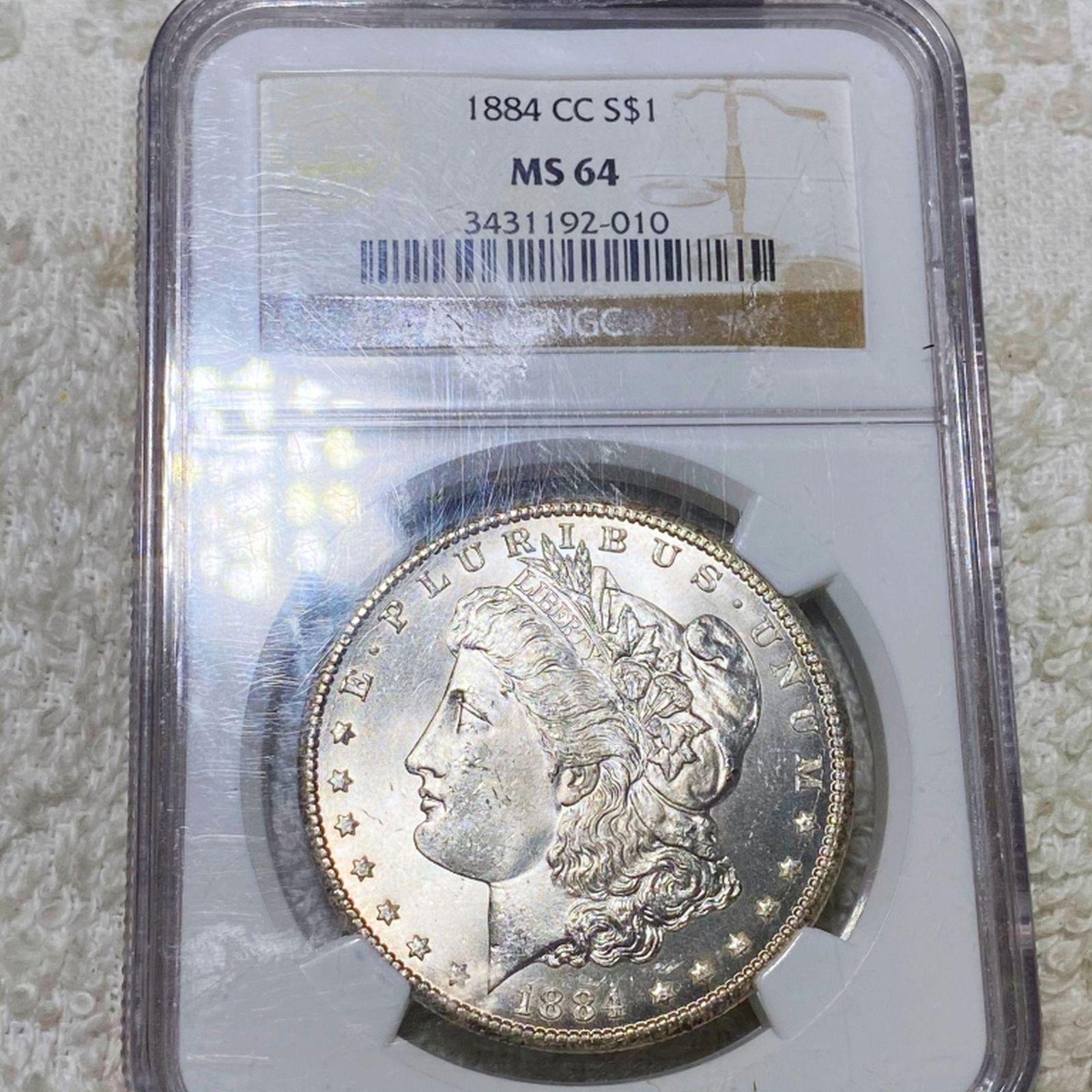 1884-CC Morgan Silver Dollar NGC - MS64 (1 of 2)