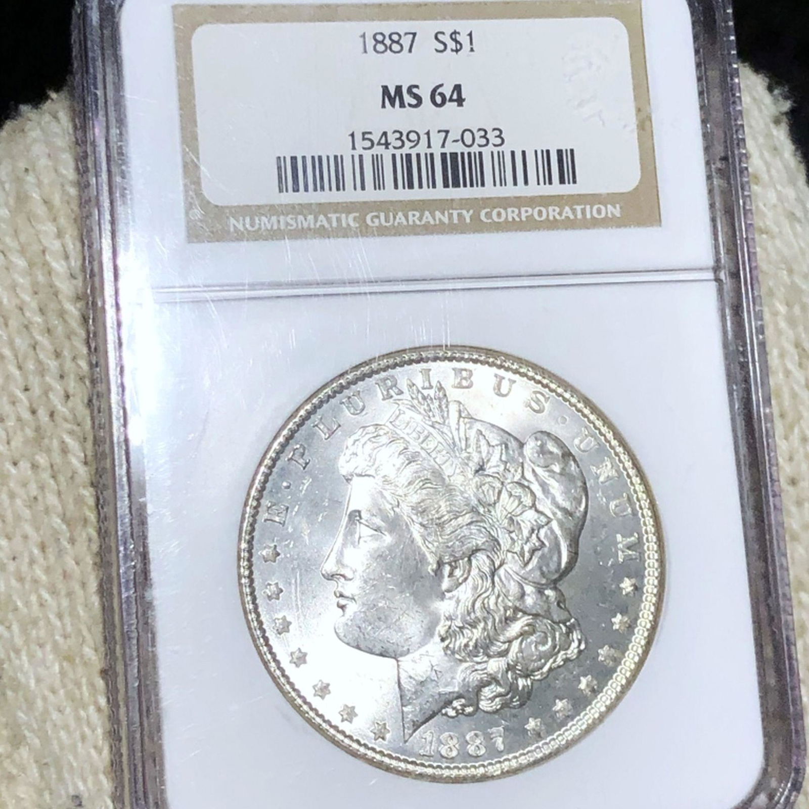 1887 Morgan Silver Dollar NGC - MS64 (1 of 2)