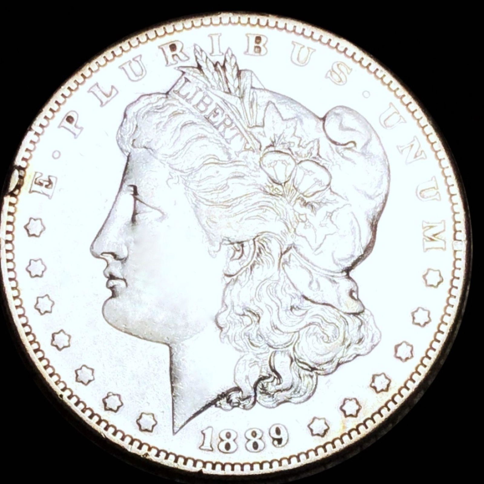 1889-O Morgan Silver Dollar NEARLY UNCIRCULATED (1 of 2)