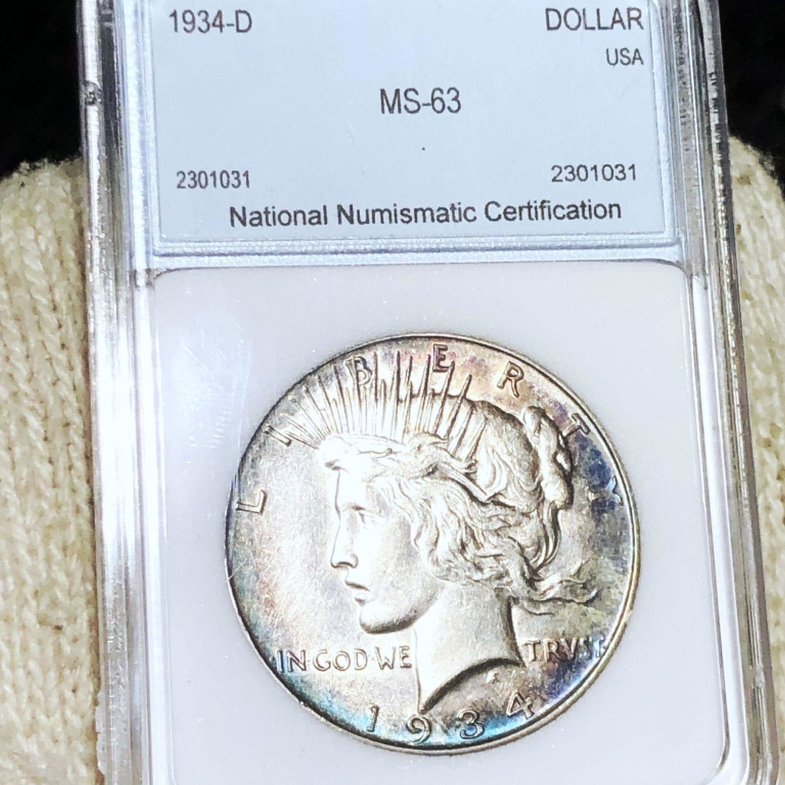 1934-D Silver Peace Dollar NNC - MS63 (1 of 2)
