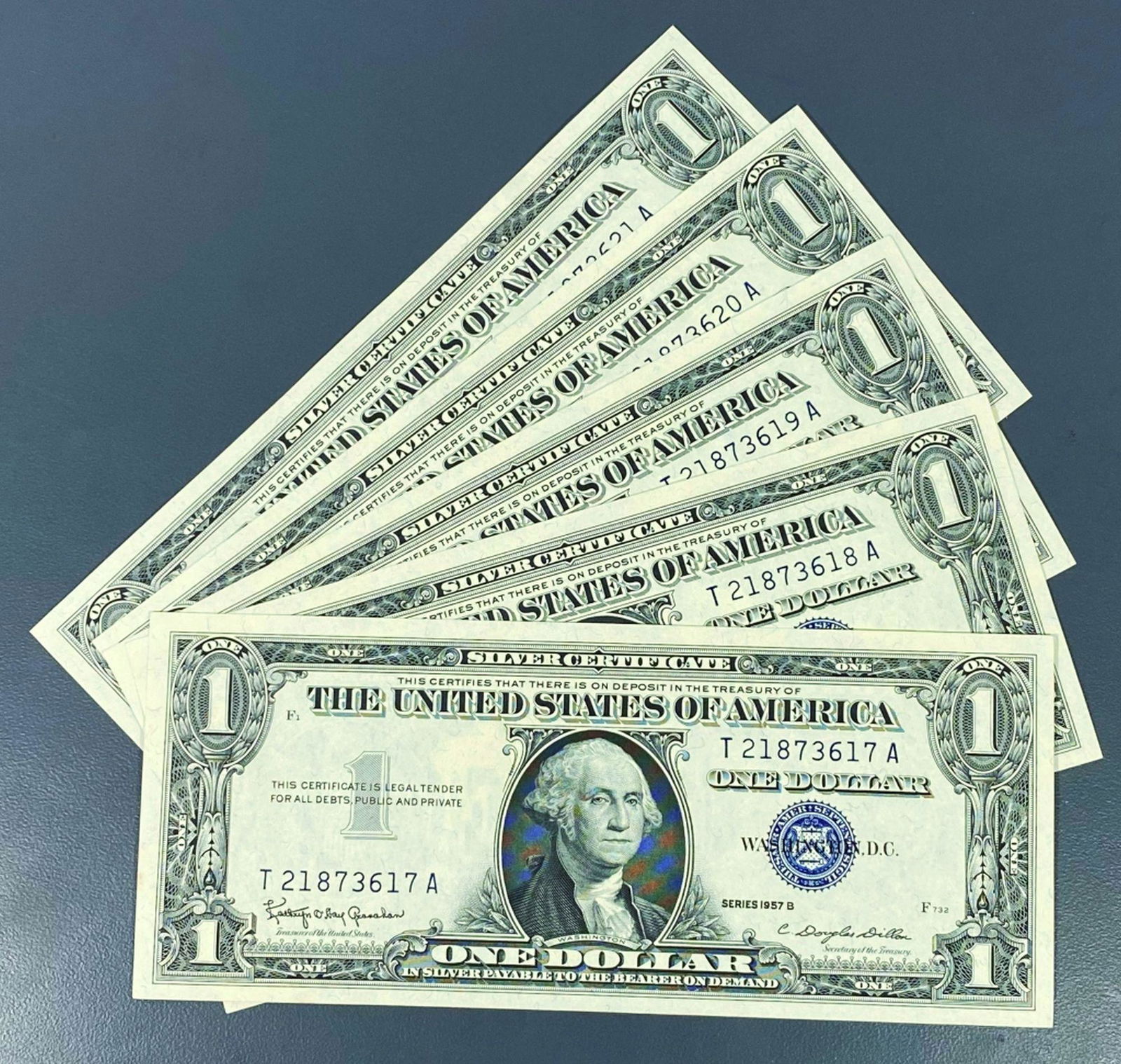(5) 1957 $1 Blue Seal Bills UNCIRCULATED (1 of 2)