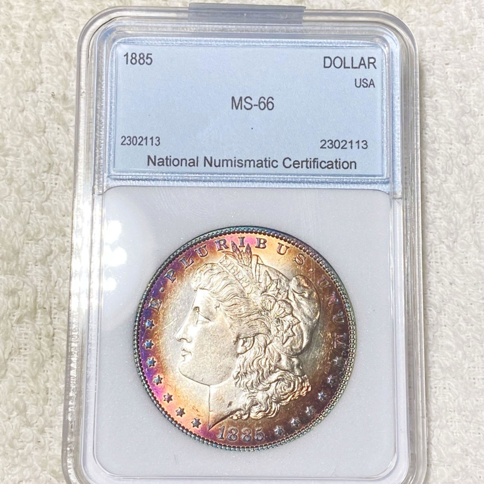 1885 Morgan Silver Dollar NNC - MS66 (1 of 2)