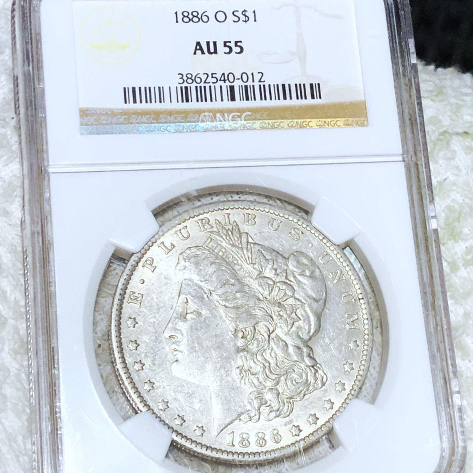 1886-O Morgan Silver Dollar NGC - AU55 (1 of 2)