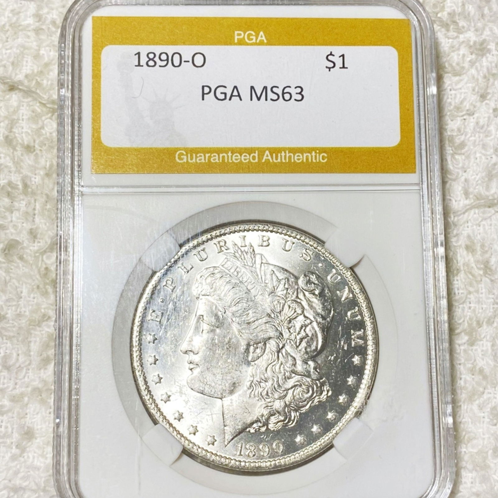 1890-O Morgan Silver Dollar PGA - MS63 (1 of 2)