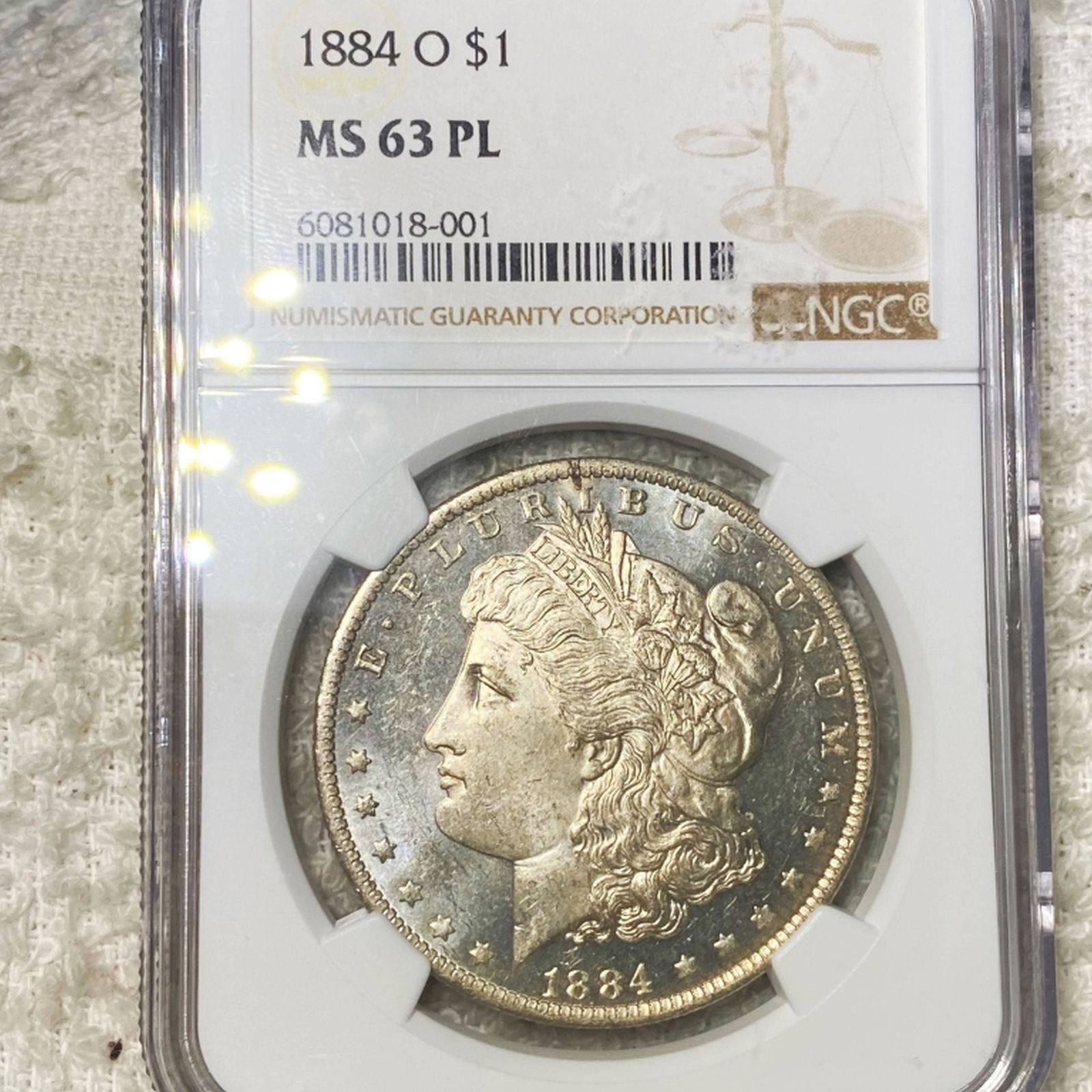 1884-O Morgan Silver Dollar NGC - MS 63 PL (1 of 2)