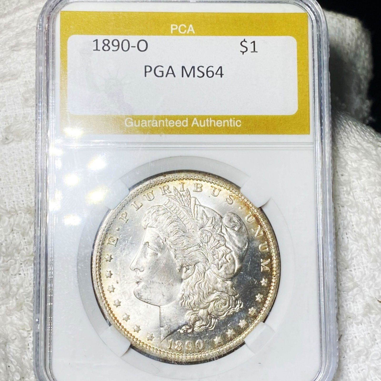1890-O Morgan Silver Dollar PGA - MS64 (1 of 2)