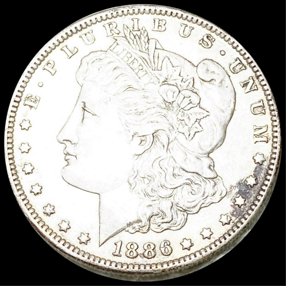 1886-O Morgan Silver Dollar CLOSELY UNC (1 of 2)