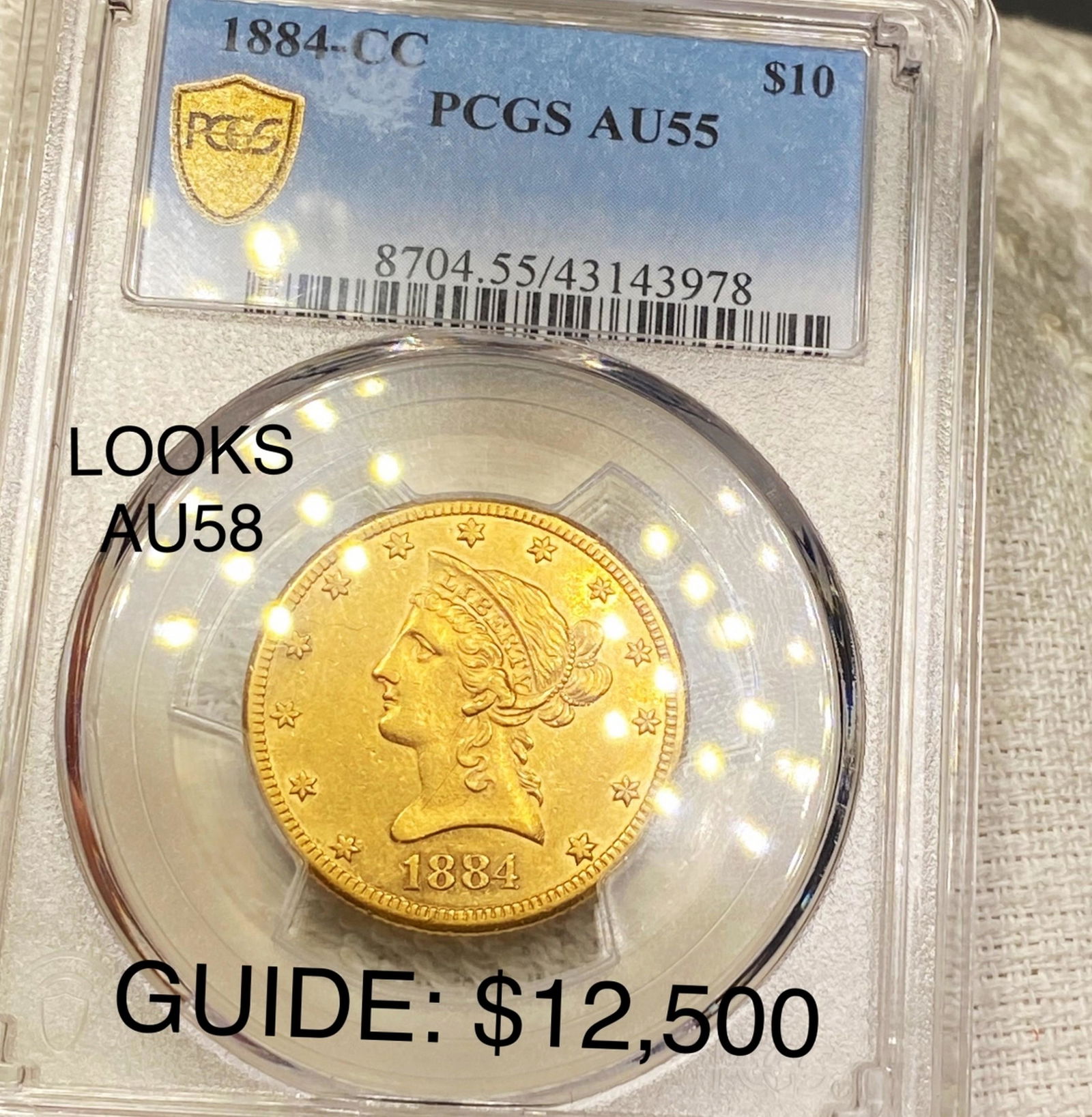 1884-CC $10 Gold Eagle PCGS - AU55 LOOKS AU58 (1 of 2)