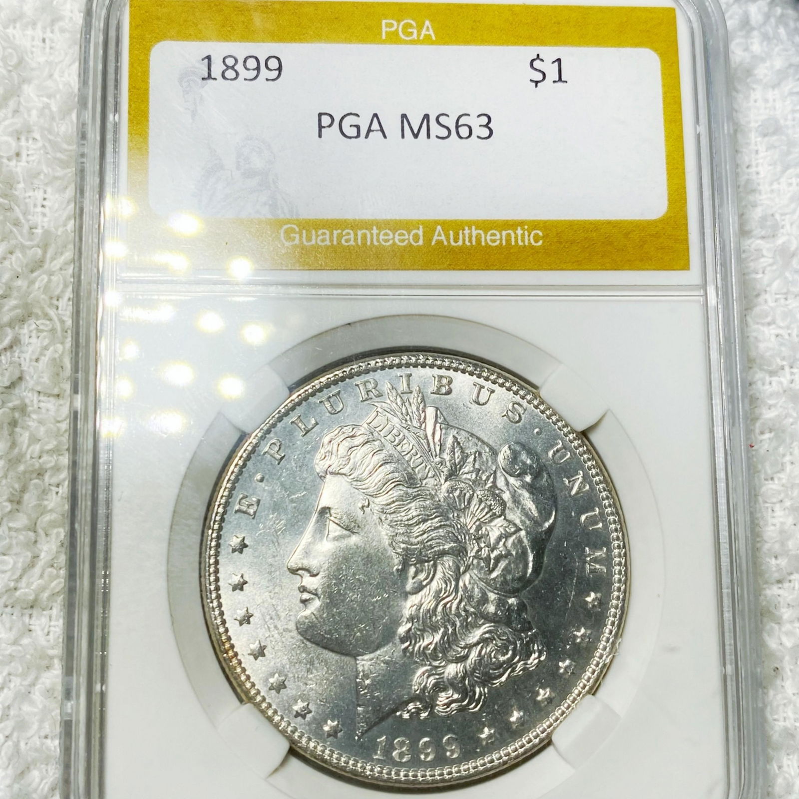 1899 Morgan Silver Dollar PGA - MS63 (1 of 2)