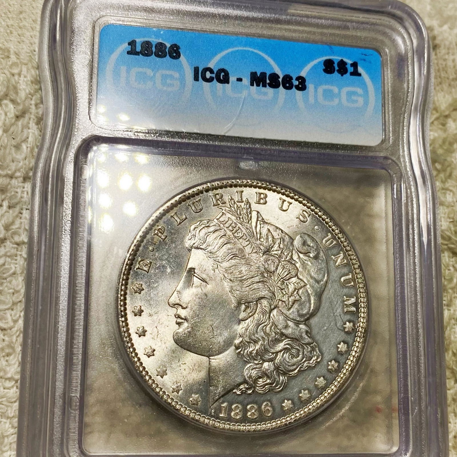 1886 Morgan Silver Dollar ICG - MS63 (1 of 2)