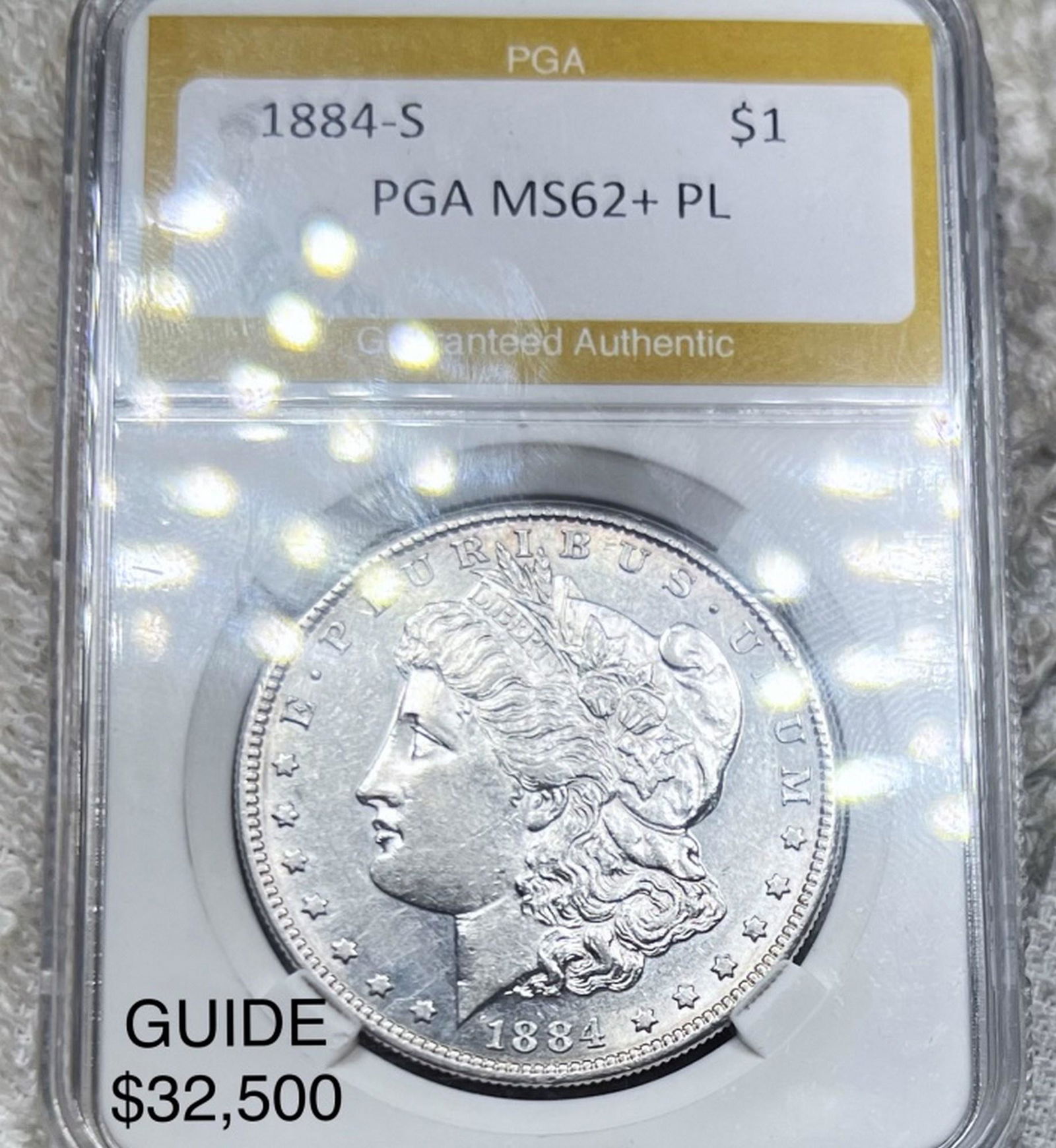 1884-S Morgan Silver Dollar PGA - MS 62+ PL (1 of 2)