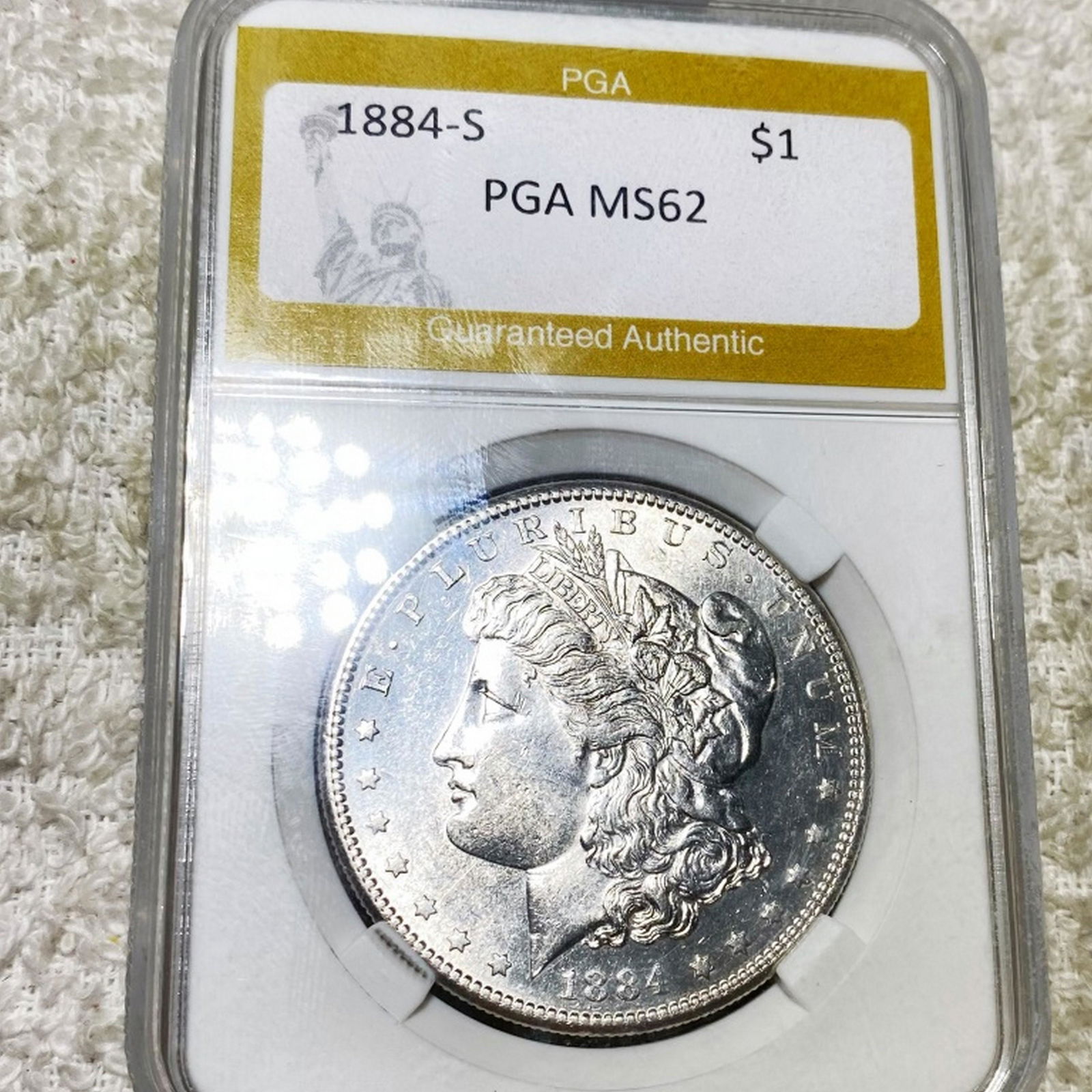 1884-S Morgan Silver Dollar PGA - MS62 (1 of 2)