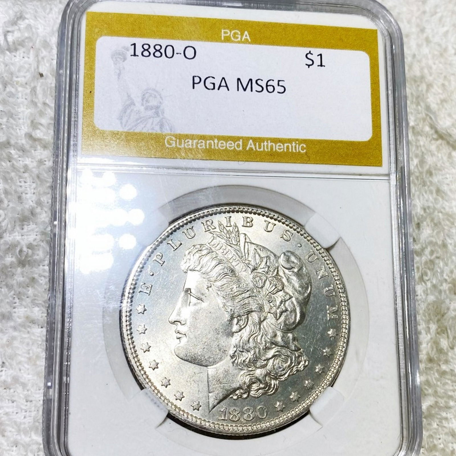 1880-O Morgan Silver Dollar PGA - MS65 (1 of 2)