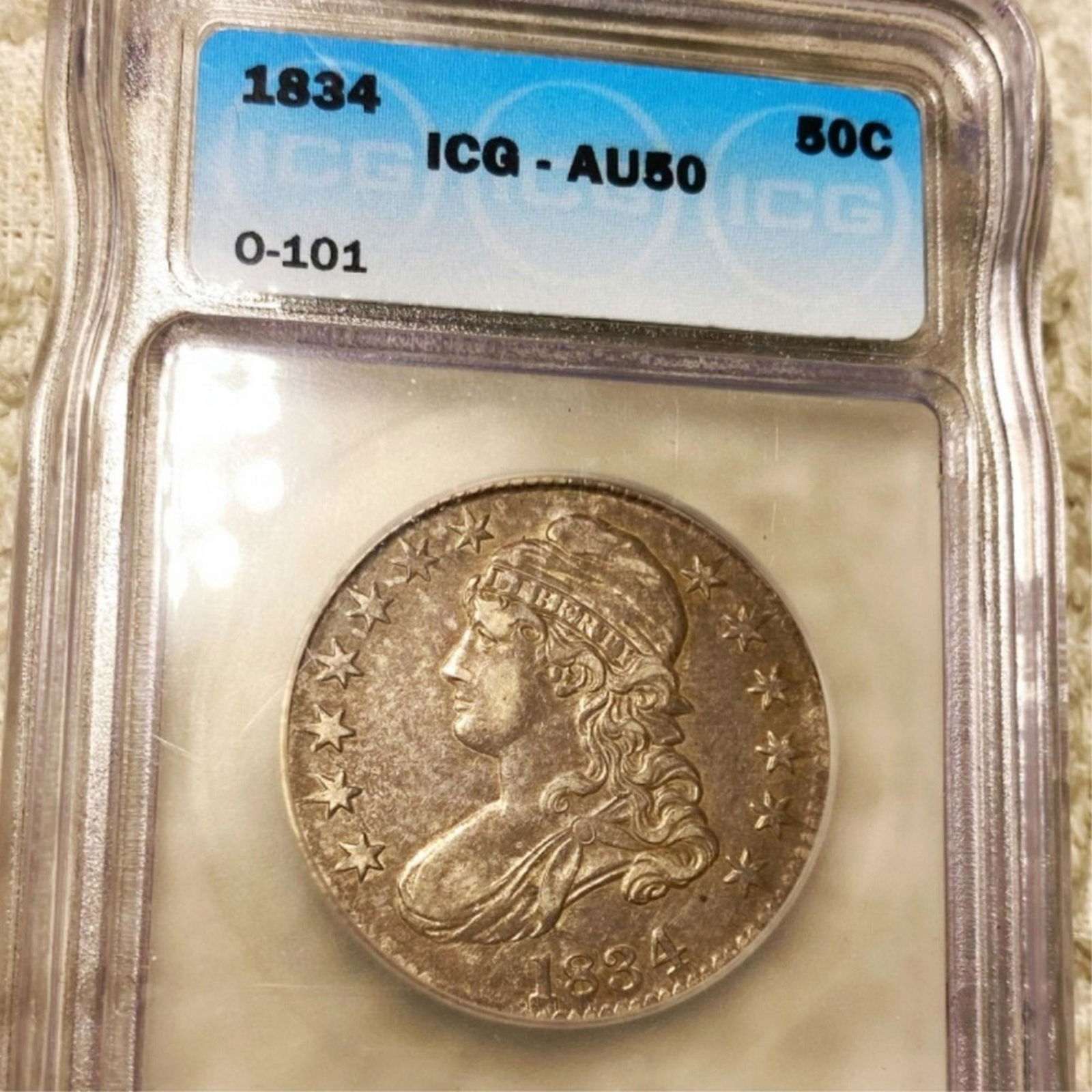 1834 Capped Bust Half Dollar ICG - AU50 (1 of 2)