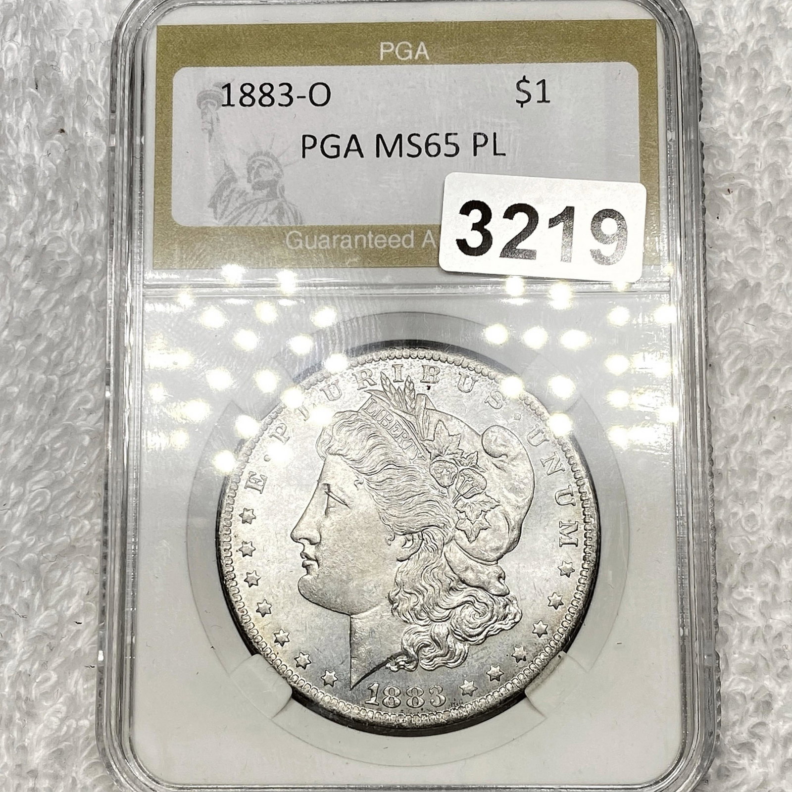 1883-O Morgan Silver Dollar PGA - MS65 PL: 1883-O Morgan Silver Dollar PGA - MS65 PL