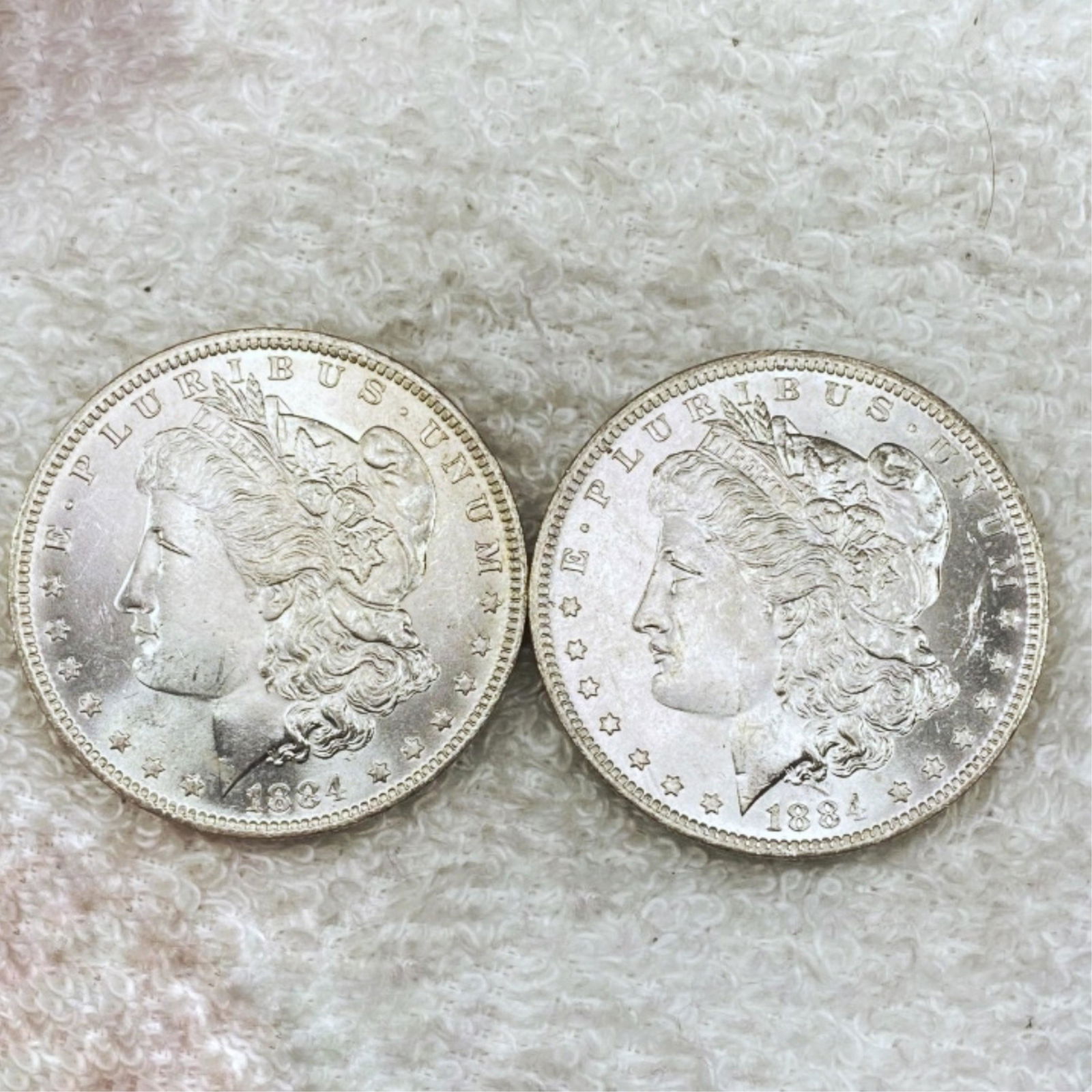(2) 1884-O Morgan Silver Dollar UNCIRCULATED (1 of 2)