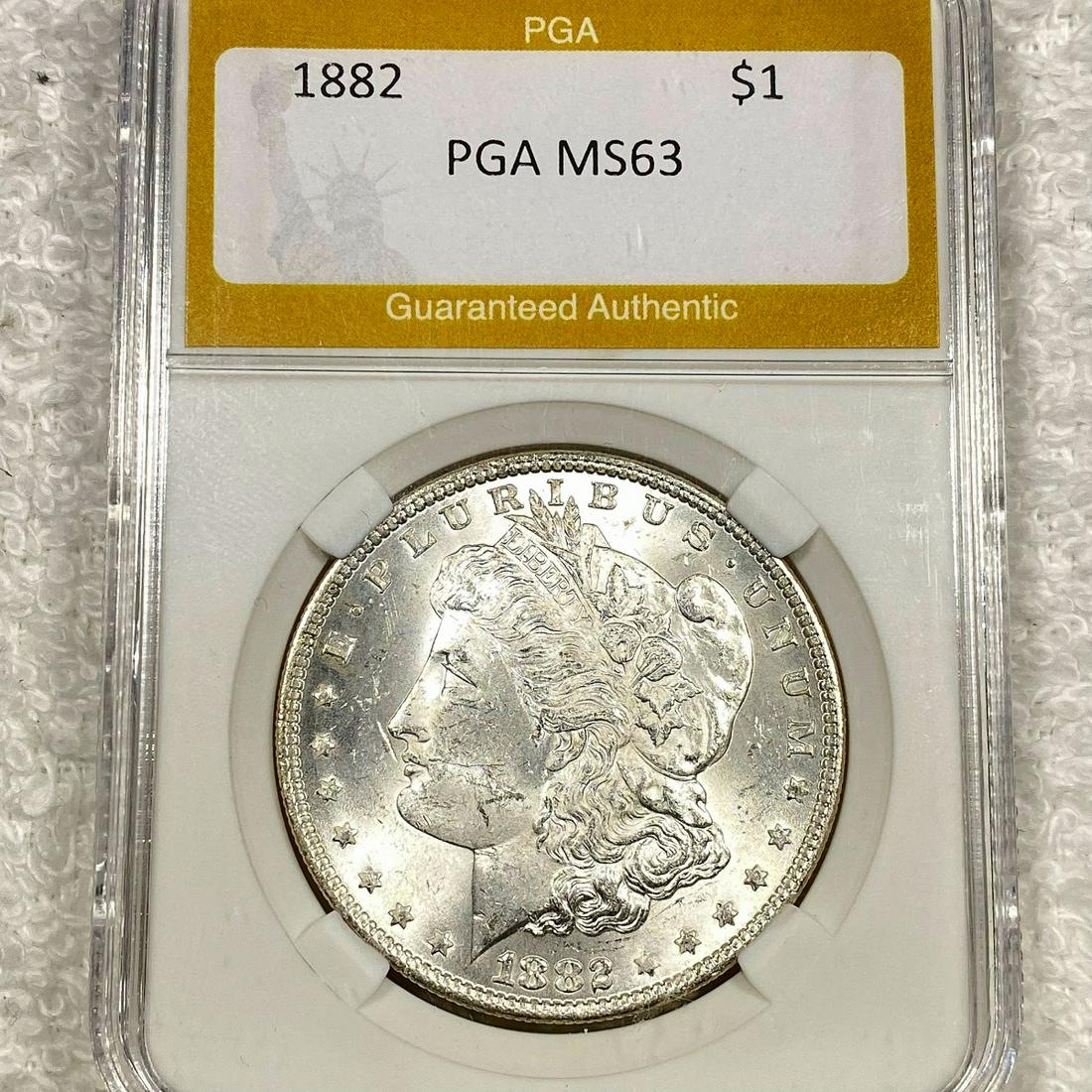 1882 Morgan Silver Dollar PGA - MS63 (1 of 2)