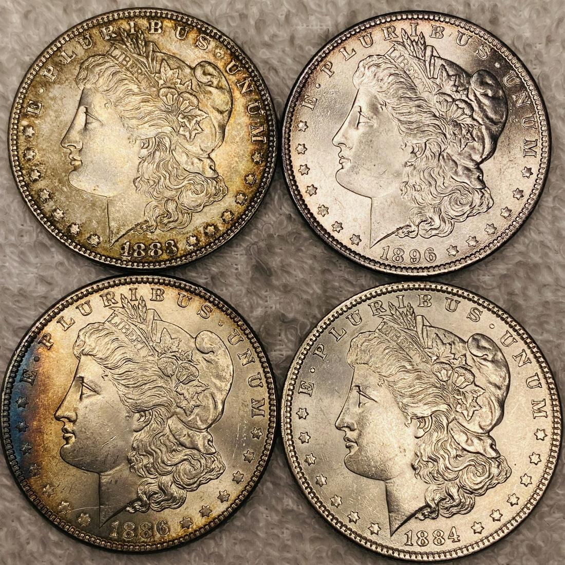4 Morgan Silver Dollars UNCIRCULATED (1 of 2)