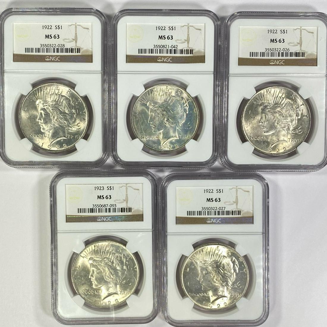(4) 1922 (1) 1923 Silver Peace Dollar NGC - MS63 (1 of 2)