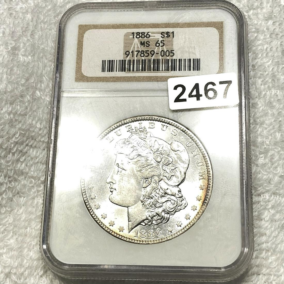1886 Morgan Silver Dollar NGC - MS65 (1 of 2)