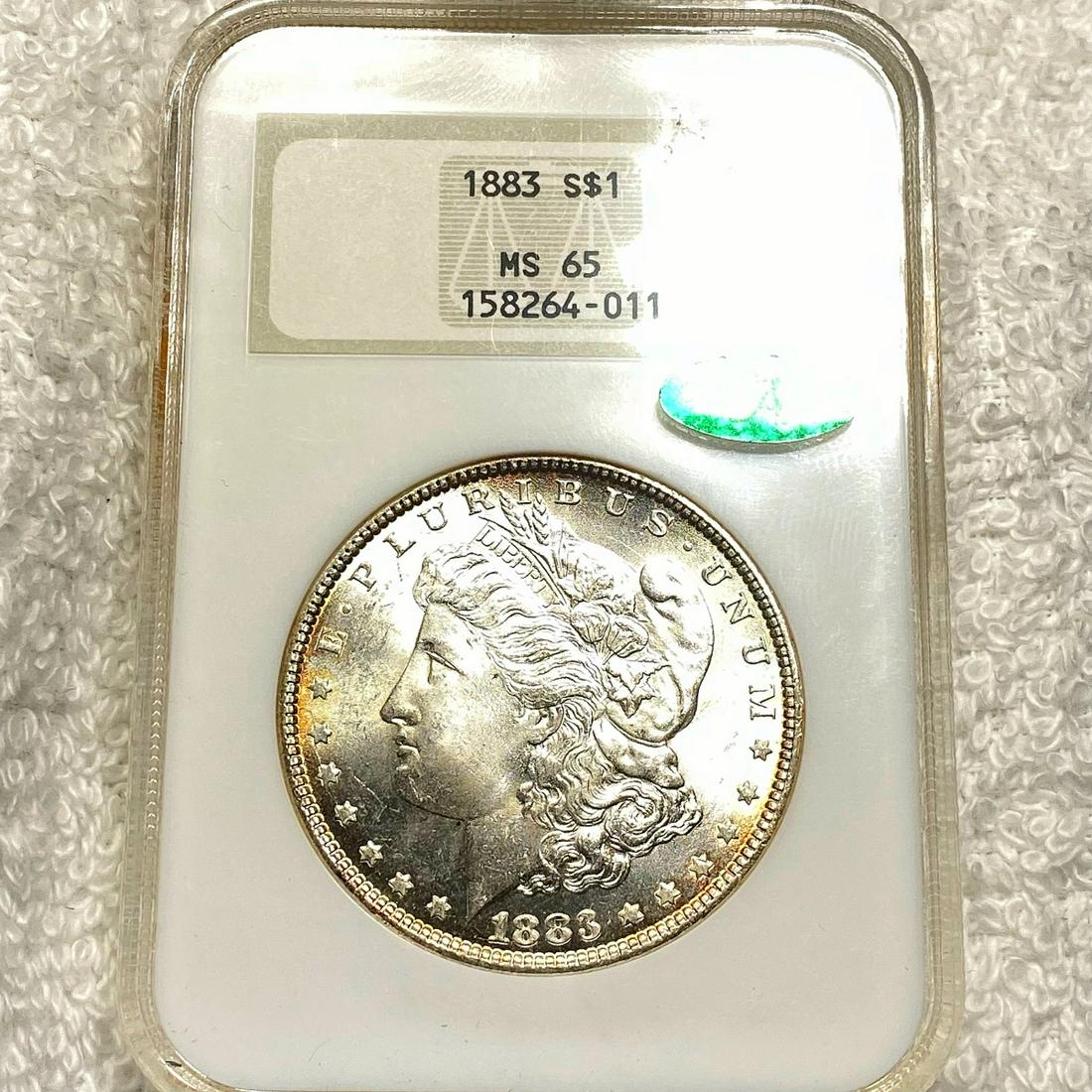 1883 Morgan Silver Dollar NGC - MS65 (1 of 2)