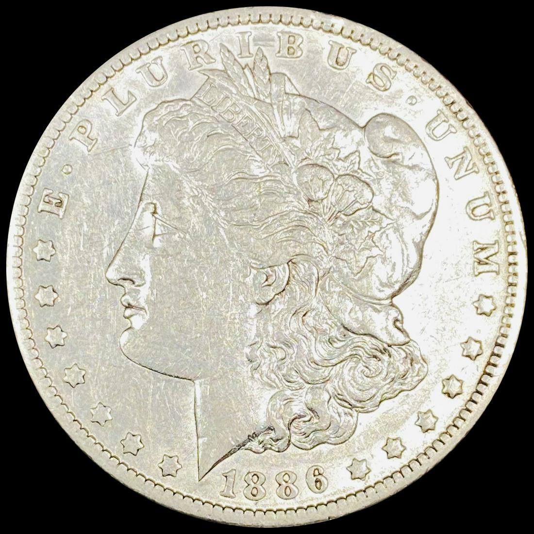 1886-O Morgan Silver Dollar CLOSELY UNCIRCULATED (1 of 2)