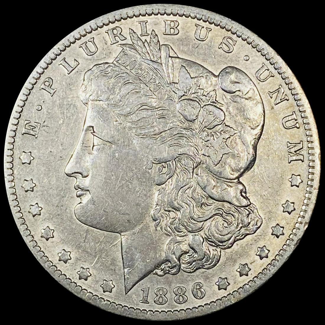 1886-O Morgan Silver Dollar NEARLY UNCIRCULATED (1 of 2)